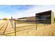 Metal horse stables with covered stalls and runs at 32905 N 140Th St, Scottsdale, AZ 85262