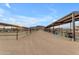 Pathway between rows of horse stables at 32905 N 140Th St, Scottsdale, AZ 85262