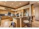 Spacious kitchen featuring wood cabinets and granite island at 32905 N 140Th St, Scottsdale, AZ 85262