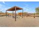 Pergola with patio furniture and raised garden beds at 32905 N 140Th St, Scottsdale, AZ 85262