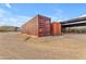 Large rusty storage container on gravel lot at 32905 N 140Th St, Scottsdale, AZ 85262