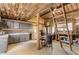 Rustic-style kitchen and dining area in tack room at 32905 N 140Th St, Scottsdale, AZ 85262