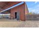 Rustic tack room with open door and chalkboard sign at 32905 N 140Th St, Scottsdale, AZ 85262