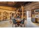 Interior of tack room with loft and seating area at 32905 N 140Th St, Scottsdale, AZ 85262