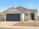 Charming single story home with a two car garage and a beautiful desert rock yard at 330 S San Fernando Ln, Casa Grande, AZ 85194