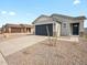 Charming single story home with a two car garage and a beautiful desert rock yard at 330 S San Fernando Ln, Casa Grande, AZ 85194