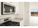 Kitchen featuring stainless steel appliances and granite countertops at 330 S San Fernando Ln, Casa Grande, AZ 85194