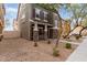 Two-story townhome with stone and siding exterior at 34619 N 30Th Ave, Phoenix, AZ 85086