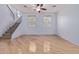 Bright living room featuring hardwood floors and a staircase at 34619 N 30Th Ave, Phoenix, AZ 85086