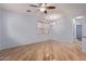 Spacious living room with hardwood floors and ceiling fan at 34619 N 30Th Ave, Phoenix, AZ 85086