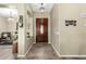 Welcoming entryway with hardwood door and tile floor at 3559 E Bridgeport Pkwy, Gilbert, AZ 85295