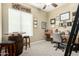 Office with natural light, unique barrel table, and walls adorned with decorative motorcycle art at 3559 E Bridgeport Pkwy, Gilbert, AZ 85295