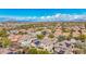 Aerial view of the property and surrounding neighborhood, mountain views at 3617 E Half Hitch Pl, Phoenix, AZ 85050