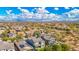 Aerial view of a residential neighborhood with houses and desert landscape at 3617 E Half Hitch Pl, Phoenix, AZ 85050