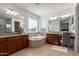 Spa-like bathroom with double vanities, soaking tub and shower at 3617 E Half Hitch Pl, Phoenix, AZ 85050