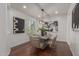 Modern dining room with contemporary light fixture and art at 3617 E Half Hitch Pl, Phoenix, AZ 85050