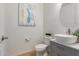 Modern powder room with updated vanity and fixtures at 3617 E Half Hitch Pl, Phoenix, AZ 85050