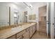 Double vanity bathroom with view into bedroom at 37 W Sierra Vista Dr, Phoenix, AZ 85013