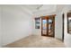 Bright bedroom with patio access and tile flooring at 37 W Sierra Vista Dr, Phoenix, AZ 85013