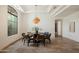 Bright dining area with round table and modern chandelier at 37 W Sierra Vista Dr, Phoenix, AZ 85013