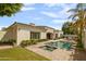 Inviting pool and spa area with grassy backyard at 37 W Sierra Vista Dr, Phoenix, AZ 85013