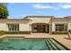 Stunning pool and patio with a view of the home's exterior at 37 W Sierra Vista Dr, Phoenix, AZ 85013