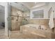 Walk-in shower with glass enclosure and tile surround at 37 W Sierra Vista Dr, Phoenix, AZ 85013