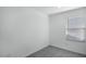 Clean, bright bedroom featuring neutral carpet, and a window at 4120 E Ghost Flower Ln, San Tan Valley, AZ 85140