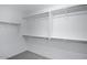 Walk-in closet with ample shelving and hanging space for organized storage at 4120 E Ghost Flower Ln, San Tan Valley, AZ 85140