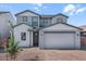 Charming two-story home featuring a two-car garage and appealing curb appeal at 4120 E Ghost Flower Ln, San Tan Valley, AZ 85140