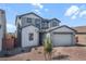 Charming two-story home with a two-car garage, nicely landscaped yard, and a welcoming entrance at 4120 E Ghost Flower Ln, San Tan Valley, AZ 85140