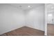 Simple room with tile floors and neutral walls, adaptable for various uses at 4120 E Ghost Flower Ln, San Tan Valley, AZ 85140