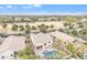 Aerial view showing the home's backyard pool and surrounding neighborhood at 4229 E Seasons Cir, Gilbert, AZ 85297