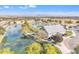 Community clubhouse with lake views and a large grassy area at 4229 E Seasons Cir, Gilbert, AZ 85297