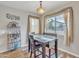 Bright dining area with wood table and access to natural light at 4229 E Seasons Cir, Gilbert, AZ 85297