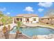 Relaxing pool area with a covered patio, and a built-in bar at 4229 E Seasons Cir, Gilbert, AZ 85297