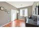 Bedroom featuring a desk, window, and decorative artwork at 433 N Neuman Pl, Chandler, AZ 85225