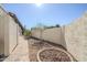 Landscaped backyard with a paved patio and mature plants at 4701 E Ardmore Rd, Phoenix, AZ 85044