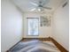 Bright bedroom with wood floors and ceiling fan at 4701 E Ardmore Rd, Phoenix, AZ 85044