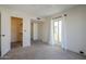 Bedroom with window, closet, and carpet flooring at 4701 E Ardmore Rd, Phoenix, AZ 85044