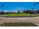 Resort entrance with lush landscaping and a central fountain at 4701 E Ardmore Rd, Phoenix, AZ 85044