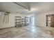 Garage with concrete floor, shelving, and storage at 4701 E Ardmore Rd, Phoenix, AZ 85044