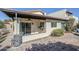 Covered patio with tile flooring, sliding glass doors, and ceiling fan at 4701 E Ardmore Rd, Phoenix, AZ 85044