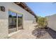 Stone patio with sliding glass door access at 4701 E Ardmore Rd, Phoenix, AZ 85044