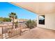 Enjoy community views from this private balcony featuring wrought iron railing and space for outdoor seating at 5010 E Mesquite Wood Ct, Phoenix, AZ 85044