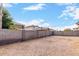 Empty gravel backyard area with a block wall at 541 W Prickly Pear Dr, Casa Grande, AZ 85122