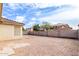 Large backyard with gravel and block wall at 541 W Prickly Pear Dr, Casa Grande, AZ 85122