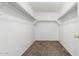 Large walk-in closet with ample shelving and carpeting at 541 W Prickly Pear Dr, Casa Grande, AZ 85122