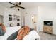 Relaxing bedroom with a king-size bed and ensuite bathroom at 6073 W Caribe Ln, Glendale, AZ 85306