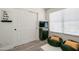 Bright bedroom with window, closet, and beanbag chairs at 6073 W Caribe Ln, Glendale, AZ 85306